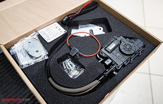 Cadillac Escalade: штатные доводчики от SmartGear